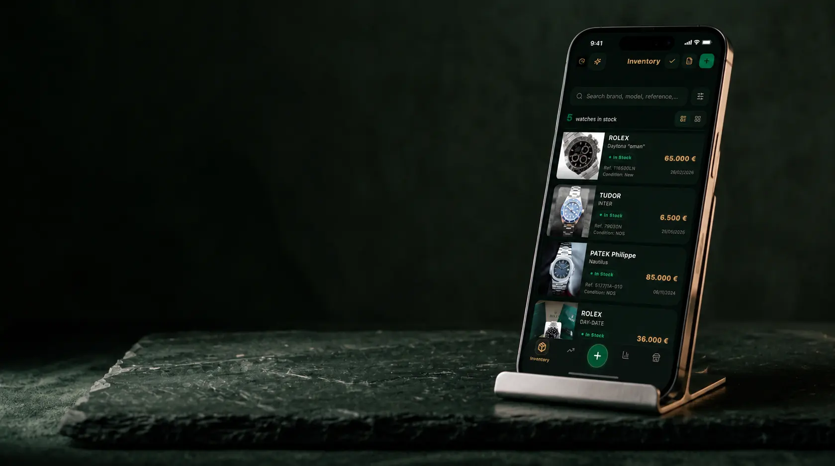 A smartphone on a dark green stone surface showing the ChronoStock inventory list